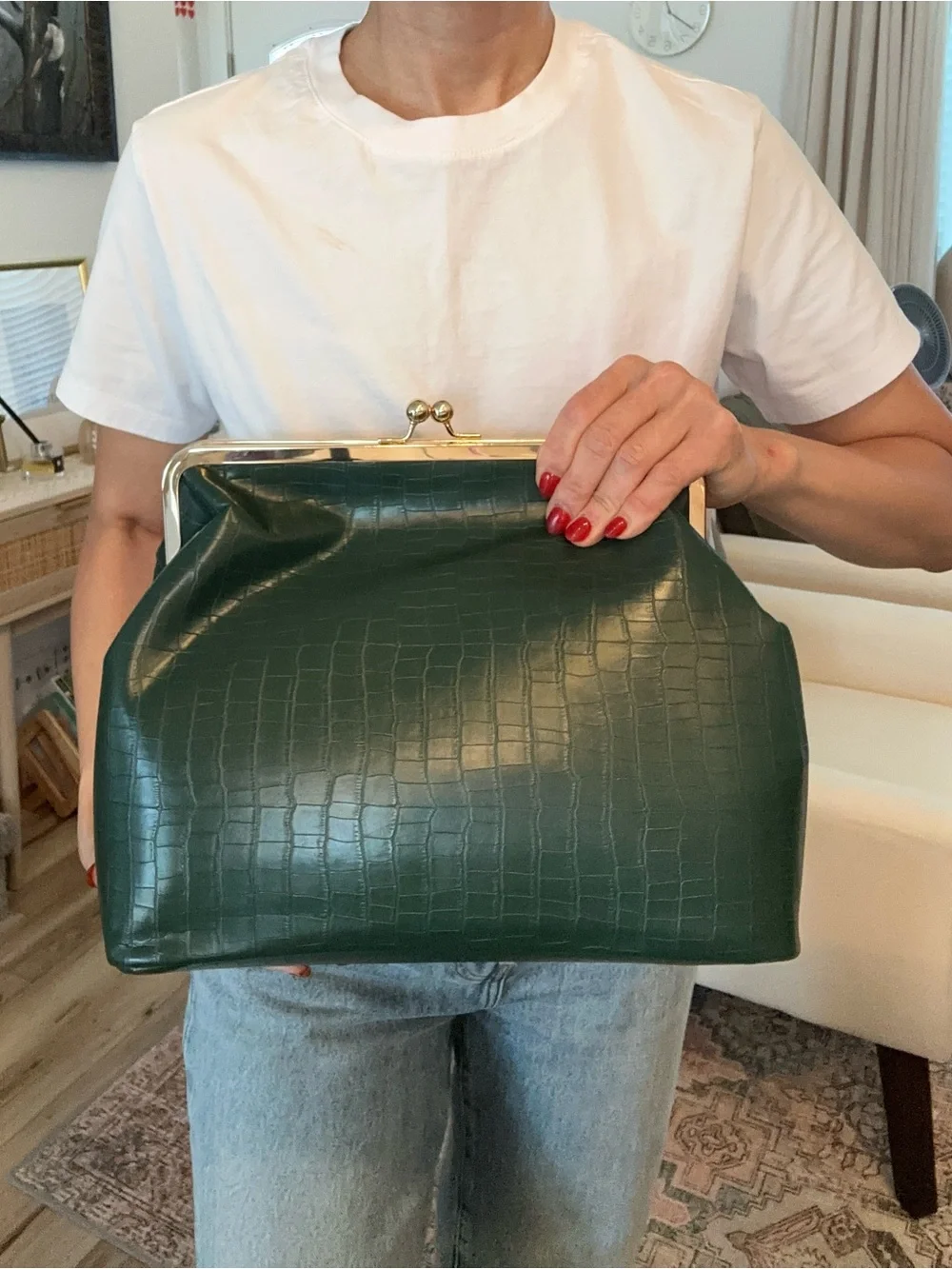 Structured Dark Green Croc-Embossed Frame Handbag with Gold kiss lock.